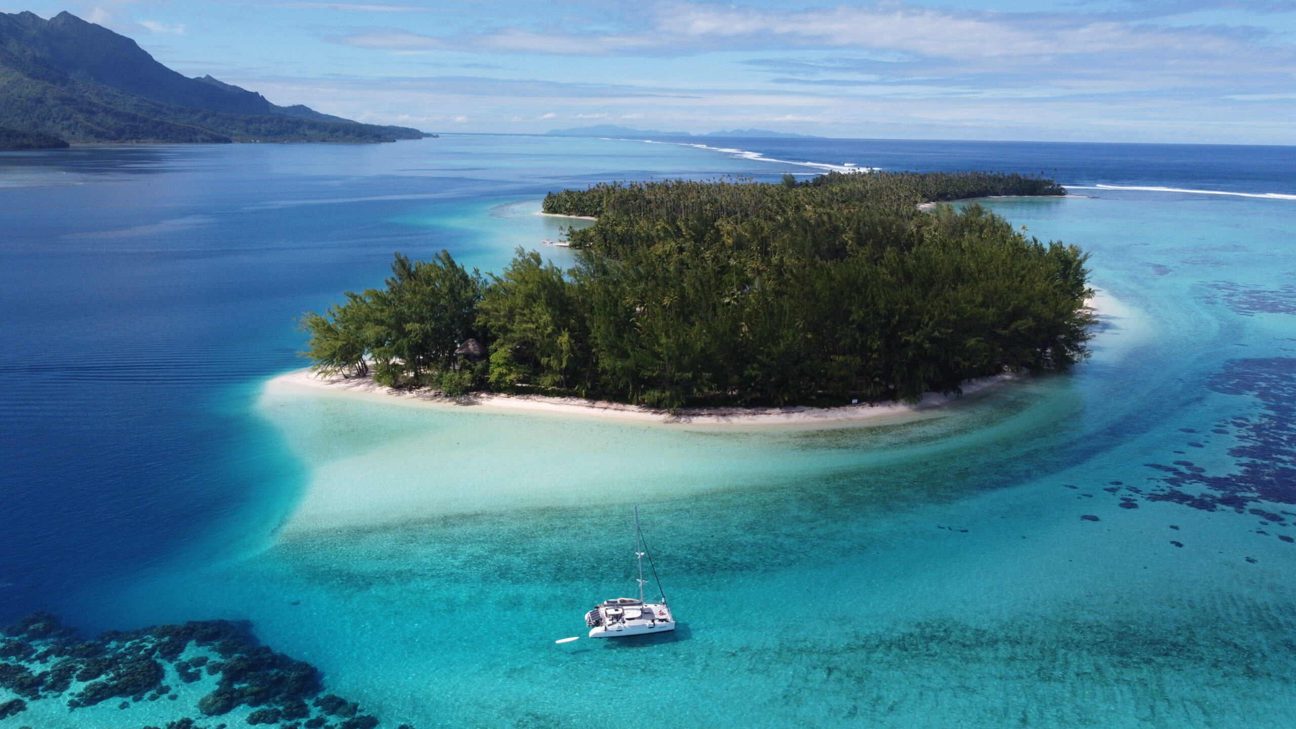 A catamaran Anchored near bora bora in french polynesia